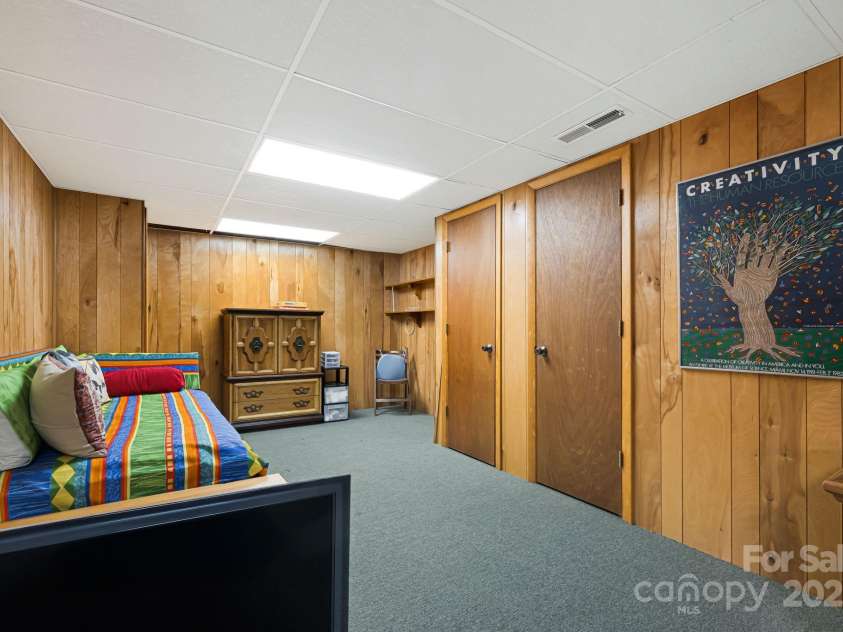 25 Westridge Court, Hendersonville, NC 28791.  MLS# CAR4279623, YatesRealty ID 24700. Basement Bedroom
