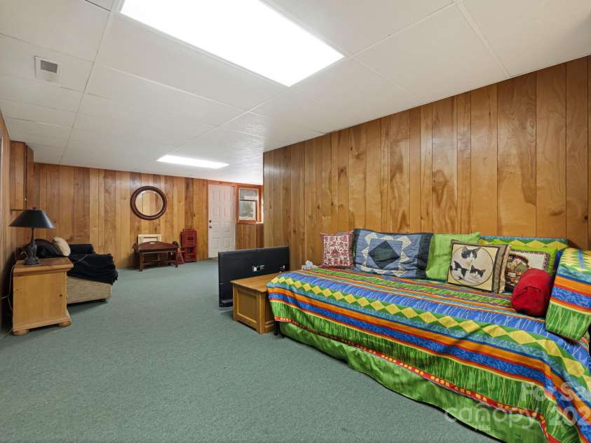 25 Westridge Court, Hendersonville, NC 28791.  MLS# CAR4279623, YatesRealty ID 24700. Basement Bedroom