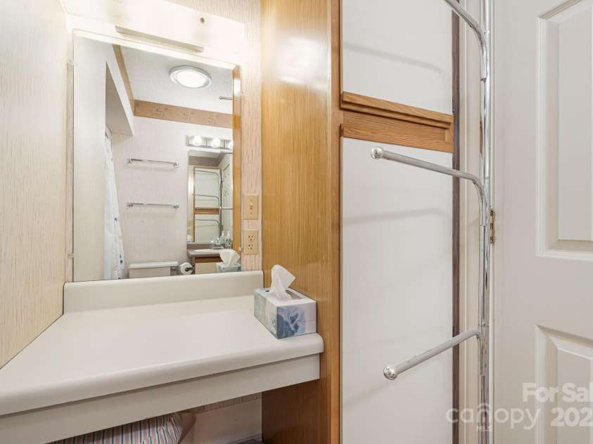 25 Westridge Court, Hendersonville, NC 28791.  MLS# CAR4279623, YatesRealty ID 24700. Guest Bath