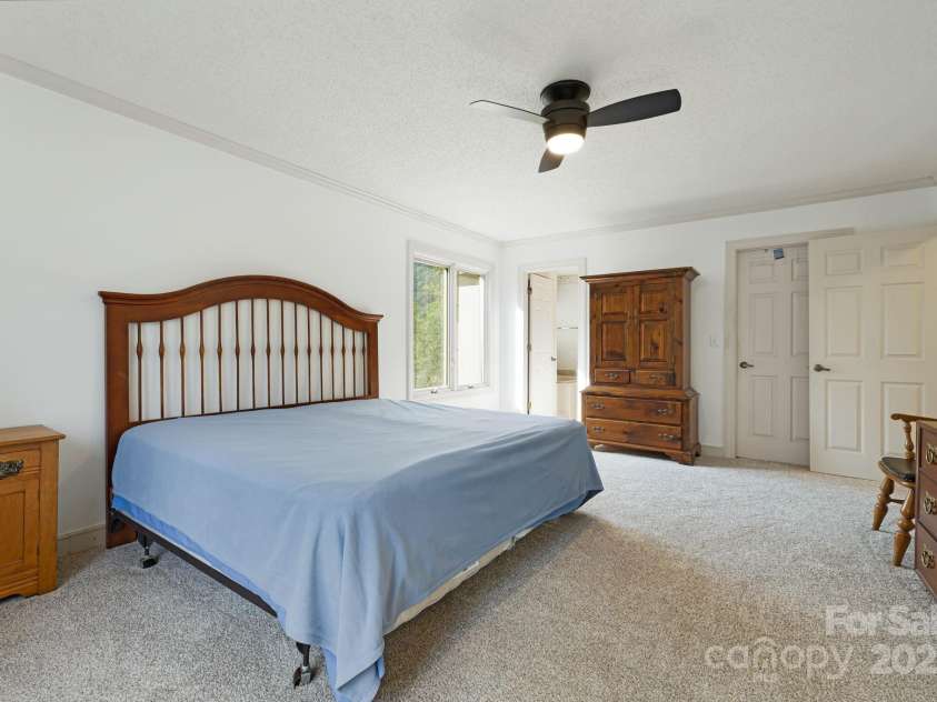 25 Westridge Court, Hendersonville, NC 28791.  MLS# CAR4279623, YatesRealty ID 24700. Primary Bedroom