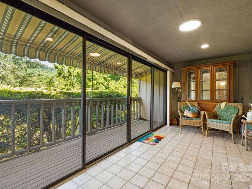 25 Westridge Court, Hendersonville, NC 28791.  MLS# CAR4279623, YatesRealty ID 24700. Rear Patio