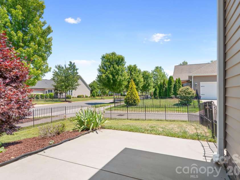 11642 Mount Argus Drive, Cornelius, NC 28031.  MLS# CAR4350521, YatesRealty ID 24708. Back terrace fenced in backyard