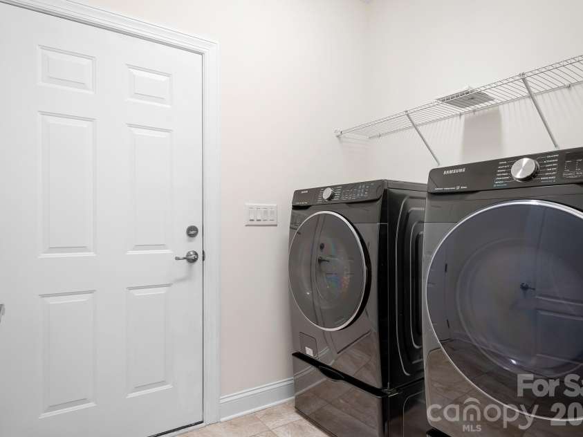 11642 Mount Argus Drive, Cornelius, NC 28031.  MLS# CAR4350521, YatesRealty ID 24708. Laundry room with door to garage