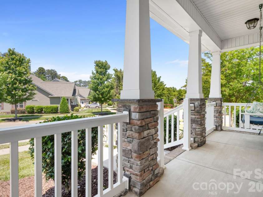 11642 Mount Argus Drive, Cornelius, NC 28031.  MLS# CAR4350521, YatesRealty ID 24708. View from front porch