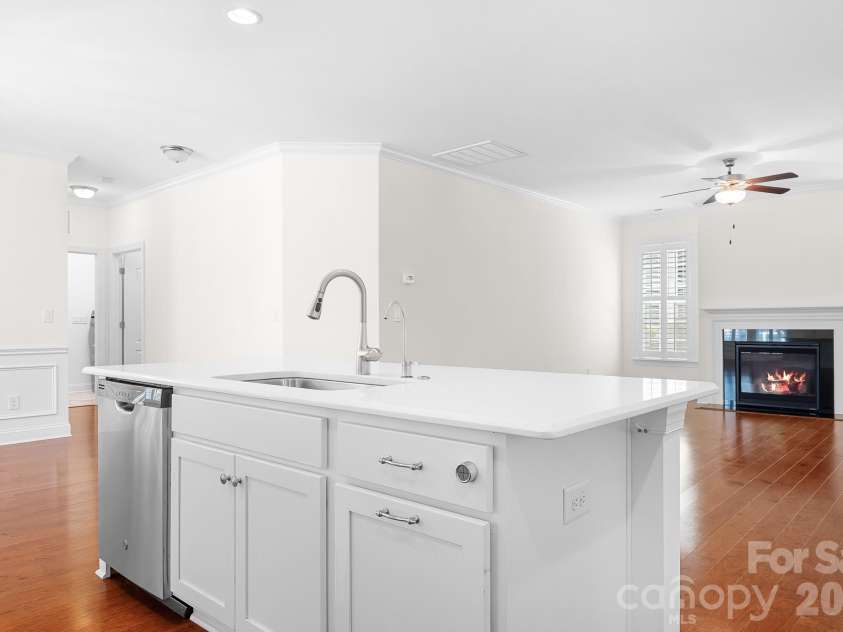 11642 Mount Argus Drive, Cornelius, NC 28031.  MLS# CAR4350521, YatesRealty ID 24708. View into great room from kitchen