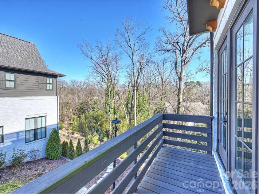 2428 Runnymede Lane, Charlotte, NC 28209.  MLS# CAR4342917, YatesRealty ID 24717. Balcony with views of the greenway