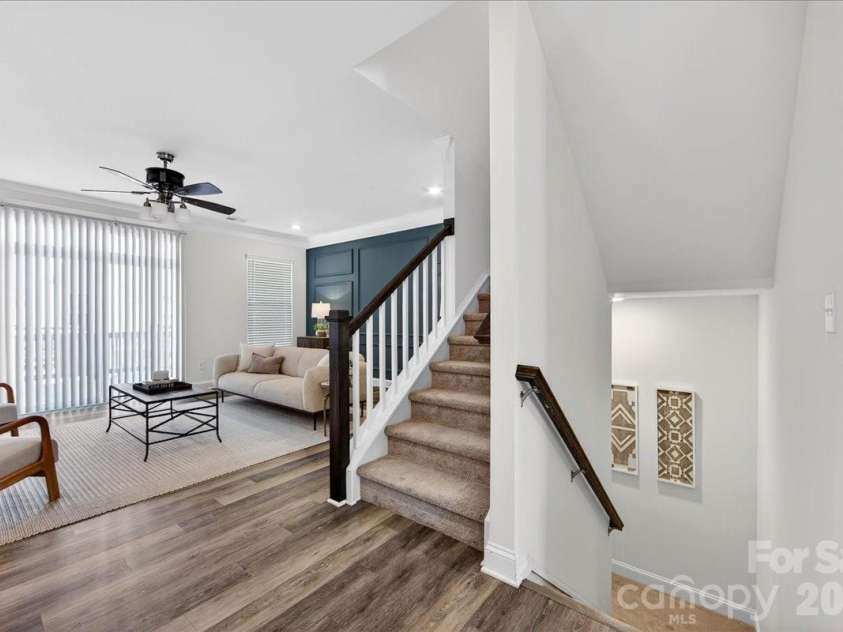 10436 Glenmere Creek Circle, Charlotte, NC 28262.  MLS# CAR4369071, YatesRealty ID 24718. Second Floor landing leading to Open Floor Plan.