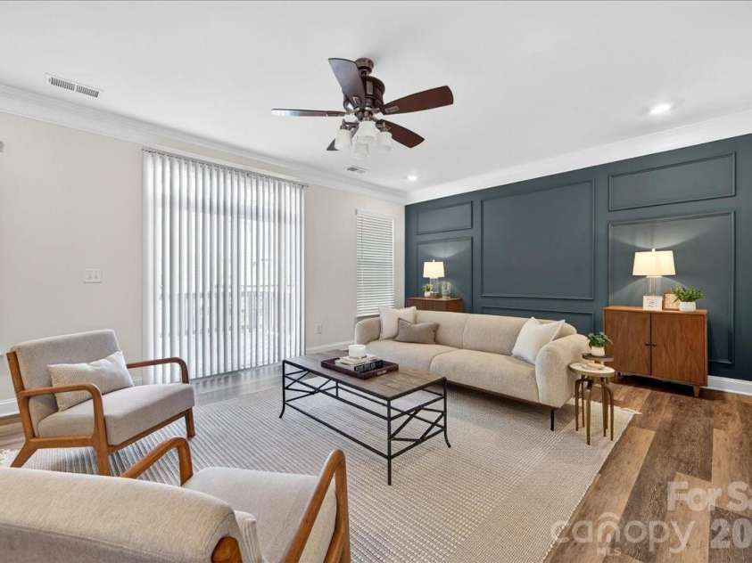 10436 Glenmere Creek Circle, Charlotte, NC 28262.  MLS# CAR4369071, YatesRealty ID 24718. Take the conversation outside beyond the sliders to oversized deck.
