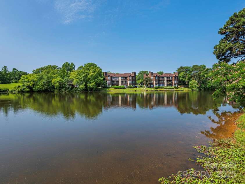 8208 Cedar Glen Drive, Charlotte, NC 28212.  MLS# CAR4265239, YatesRealty ID 24725. Community Pond