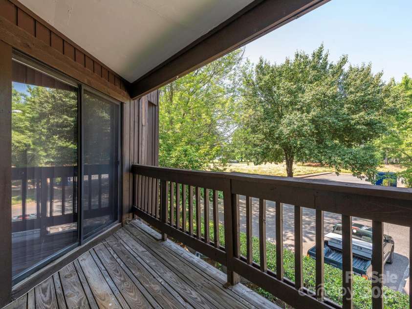 8208 Cedar Glen Drive, Charlotte, NC 28212.  MLS# CAR4265239, YatesRealty ID 24725. Living Room Balcony