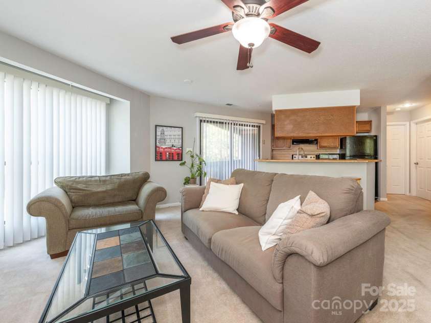 8208 Cedar Glen Drive, Charlotte, NC 28212.  MLS# CAR4265239, YatesRealty ID 24725. Living Room into Kitchen