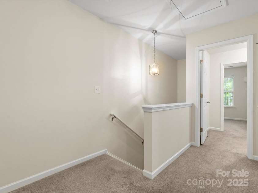 2137 Midnight Blue Lane, Fort Mill, SC 29708.  MLS# CAR4251116, YatesRealty ID 24727. Spacious hallway area at the top of the stairs