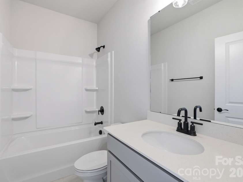 4049 Grommet Court, Matthews, NC 28105.  MLS# CAR4325054, YatesRealty ID 24731. First floor full bath