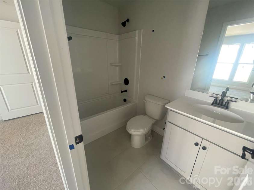 4049 Grommet Court, Matthews, NC 28105.  MLS# CAR4325054, YatesRealty ID 24731. Full bath in garage bonus 