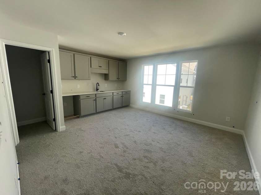 4049 Grommet Court, Matthews, NC 28105.  MLS# CAR4325054, YatesRealty ID 24731. Garage Bonus wet bar