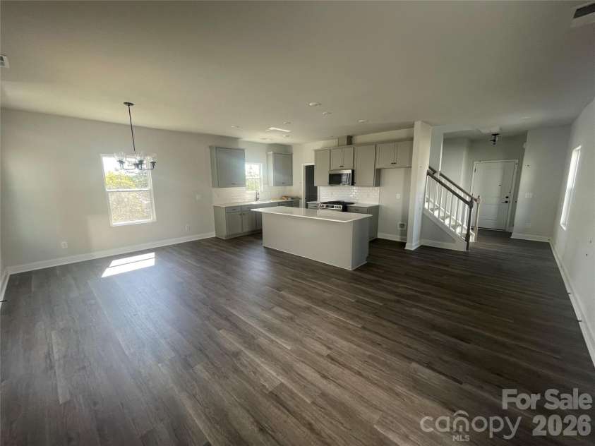 4049 Grommet Court, Matthews, NC 28105.  MLS# CAR4325054, YatesRealty ID 24731. Kitchen with 9' island with walk in pantry