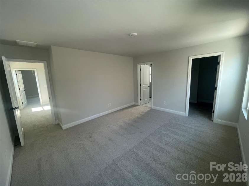 4049 Grommet Court, Matthews, NC 28105.  MLS# CAR4325054, YatesRealty ID 24731. Primary Bedroom on the back of home for maximum privacy and quiet