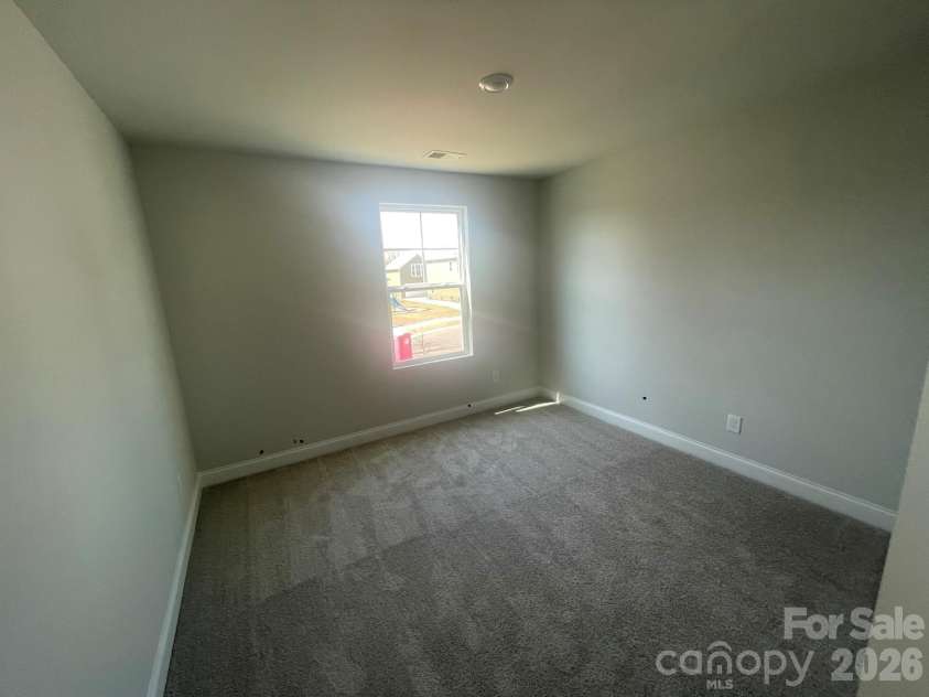 4049 Grommet Court, Matthews, NC 28105.  MLS# CAR4325054, YatesRealty ID 24731. Secondary Bedroom 