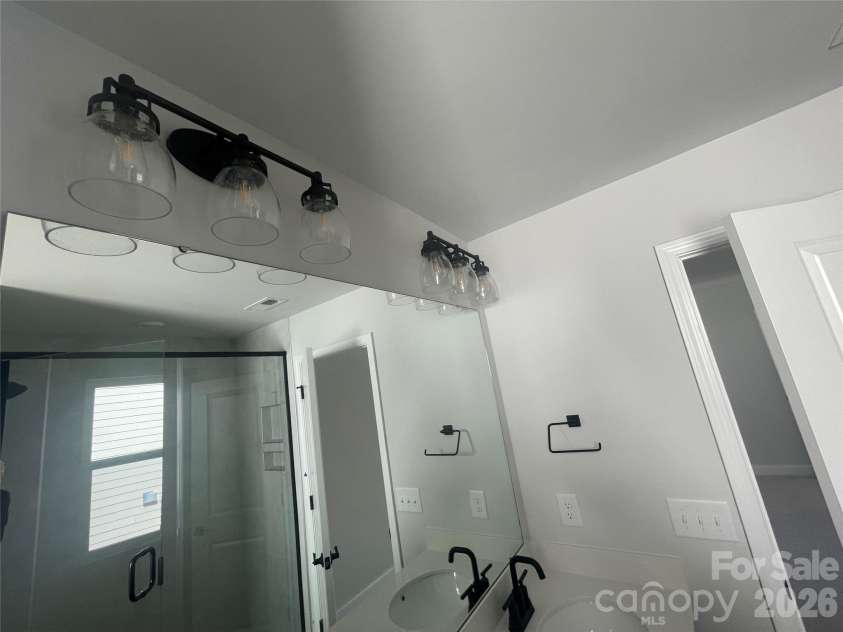 4049 Grommet Court, Matthews, NC 28105.  MLS# CAR4325054, YatesRealty ID 24731. Upgraded black fixtures