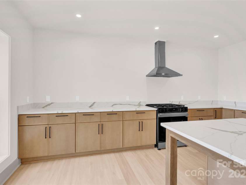 124 Clipper Lane, Mooresville, NC 28117.  MLS# CAR4253640, YatesRealty ID 24732. Basement kitchen