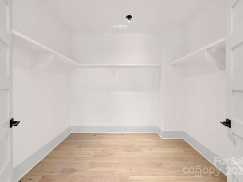 124 Clipper Lane, Mooresville, NC 28117.  MLS# CAR4253640, YatesRealty ID 24732. Primary suite has huge walk-in closet