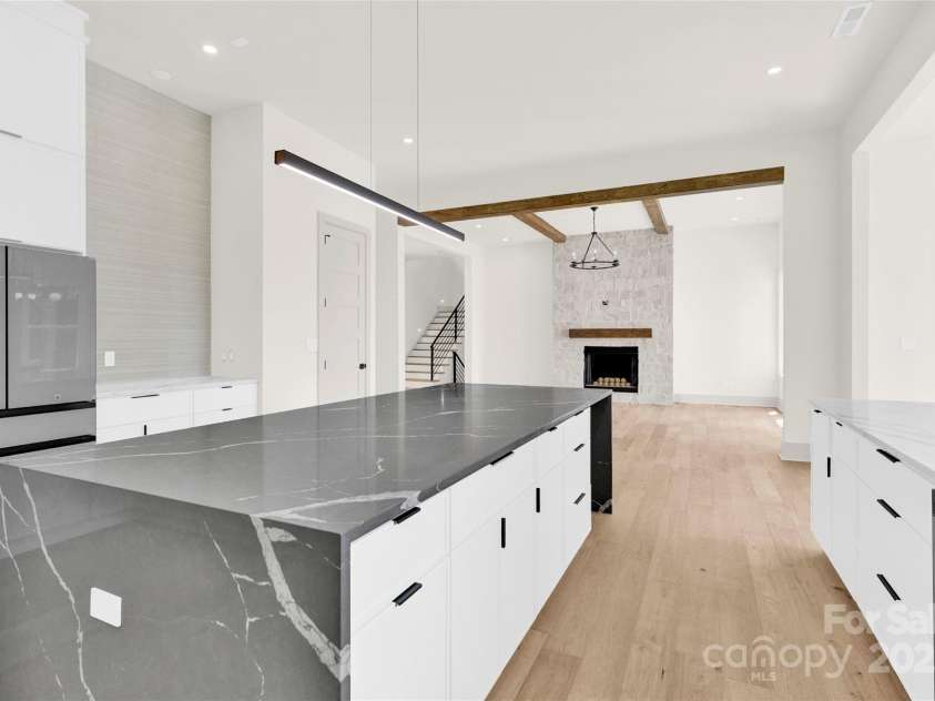124 Clipper Lane, Mooresville, NC 28117.  MLS# CAR4253640, YatesRealty ID 24732. Seamless flow from the kitchen to the great room is perfect for entertaining