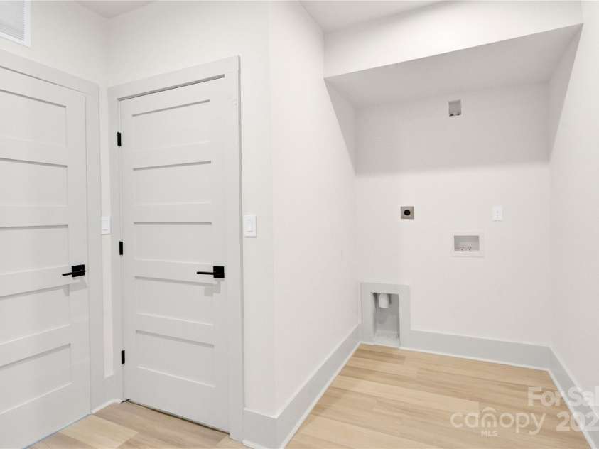 124 Clipper Lane, Mooresville, NC 28117.  MLS# CAR4253640, YatesRealty ID 24732. Second laundry room in basement with hookup and additional storage