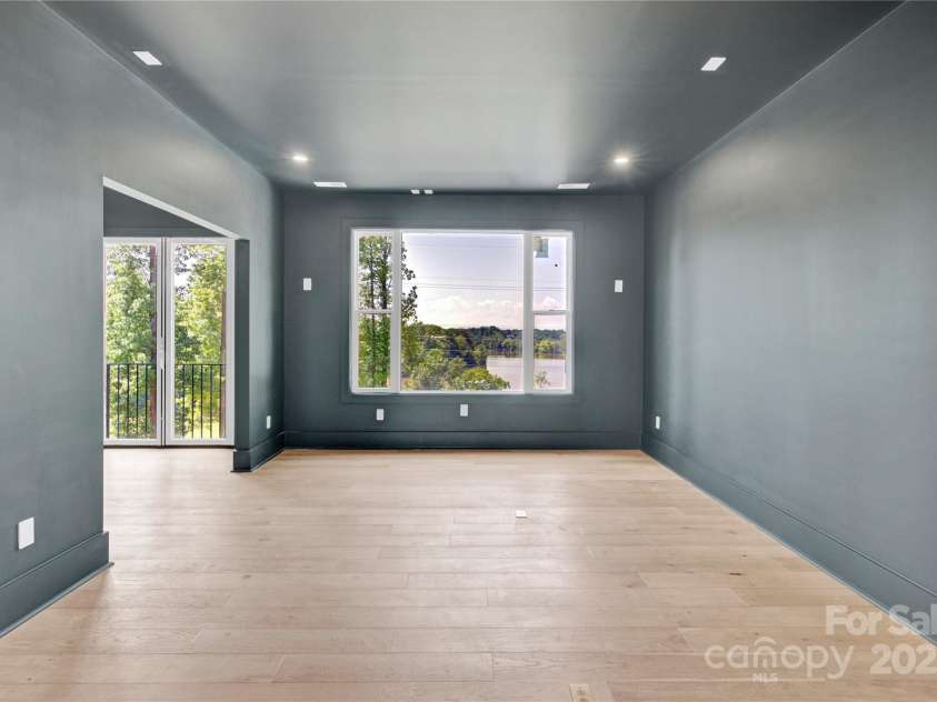 124 Clipper Lane, Mooresville, NC 28117.  MLS# CAR4253640, YatesRealty ID 24732. Sound proof media with projector