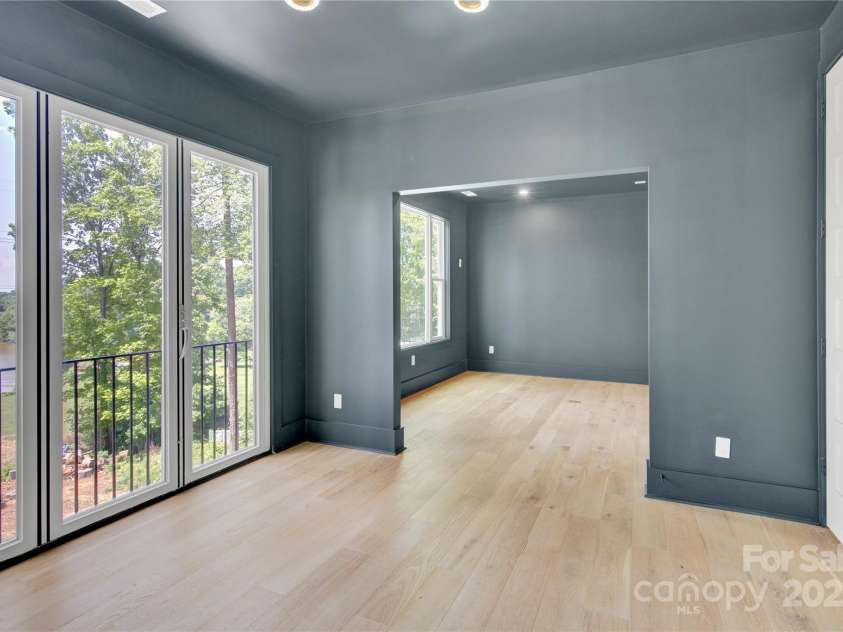 124 Clipper Lane, Mooresville, NC 28117.  MLS# CAR4253640, YatesRealty ID 24732. Upper level game room leads to media room