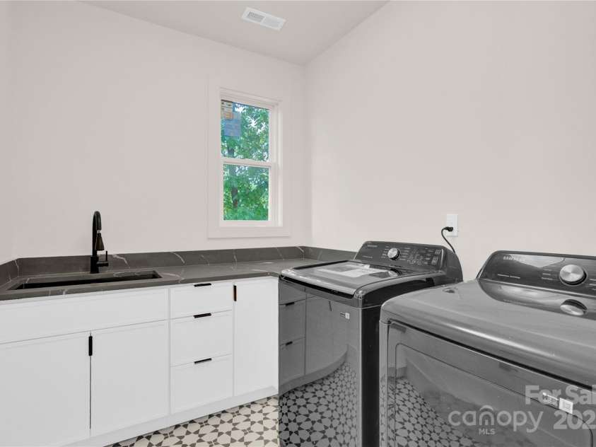 124 Clipper Lane, Mooresville, NC 28117.  MLS# CAR4253640, YatesRealty ID 24732. Upper level laundry with wet sink includes new smart W?D
