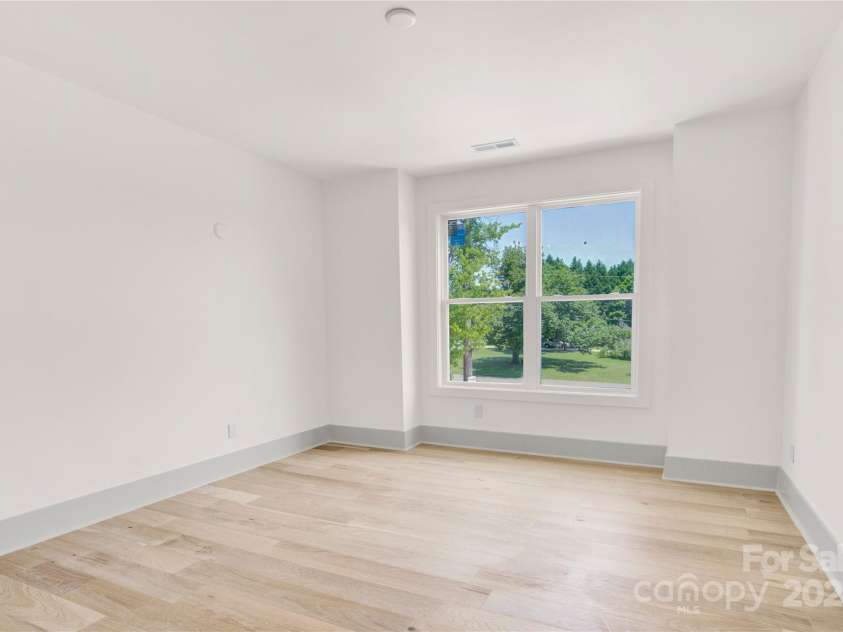 124 Clipper Lane, Mooresville, NC 28117.  MLS# CAR4253640, YatesRealty ID 24732. Upper level Room 1 offers tons of possibilities