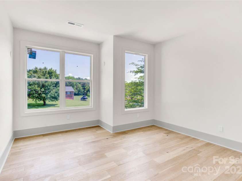 124 Clipper Lane, Mooresville, NC 28117.  MLS# CAR4253640, YatesRealty ID 24732. Upper level Room 2 offers tons of possibilities