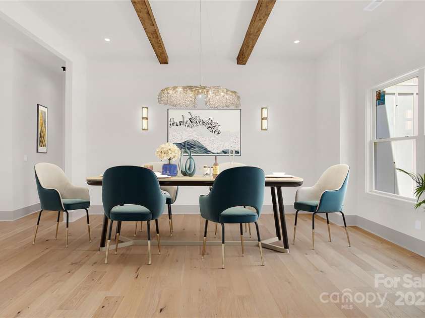 124 Clipper Lane, Mooresville, NC 28117.  MLS# CAR4253640, YatesRealty ID 24732. Virtually staged dining room off front entry