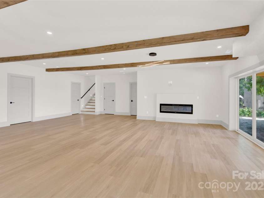 124 Clipper Lane, Mooresville, NC 28117.  MLS# CAR4253640, YatesRealty ID 24732. Wide open space in the basement makes a perfect rec room for pool table and den