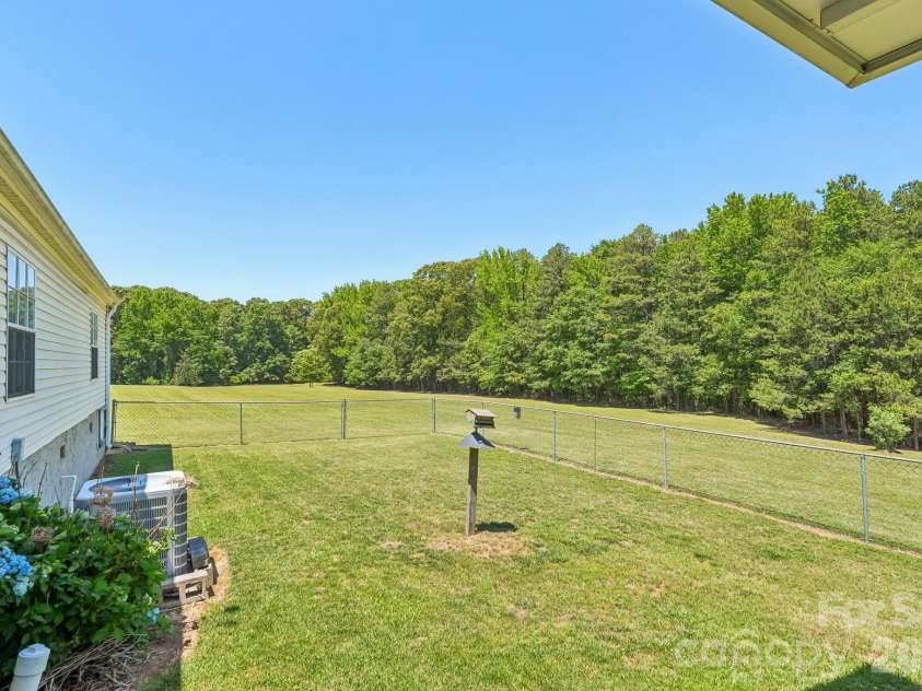 160 Allison Road, Cowpens, SC 29330.  MLS# CAR4331351, YatesRealty ID 24732. Fenced portion of back yard