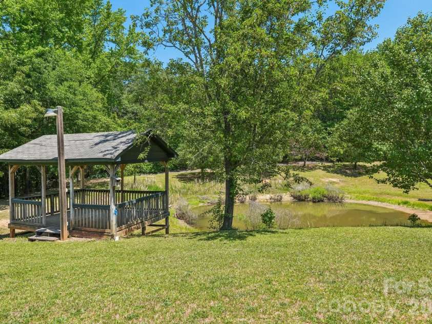 160 Allison Road, Cowpens, SC 29330.  MLS# CAR4331351, YatesRealty ID 24732. Gazebo with Pond