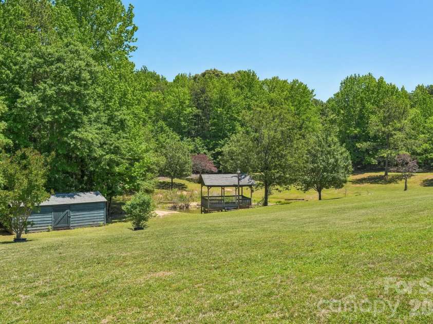 160 Allison Road, Cowpens, SC 29330.  MLS# CAR4331351, YatesRealty ID 24732. Gazebo/Pond and Shed/Storage