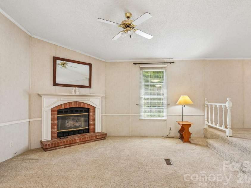 160 Allison Road, Cowpens, SC 29330.  MLS# CAR4331351, YatesRealty ID 24732. Media, Den with Fireplace