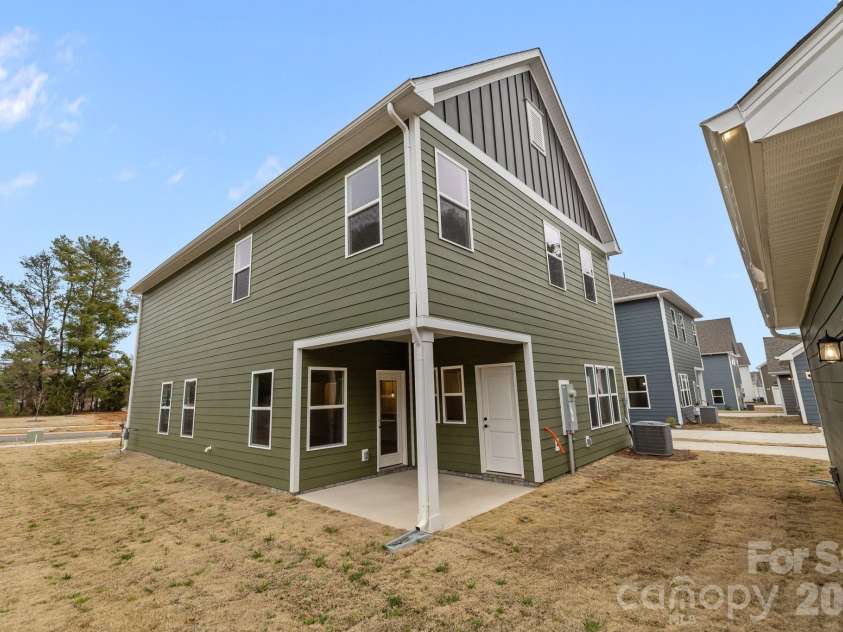 4004 Grommet Court, Matthews, NC 28105.  MLS# CAR4331659, YatesRealty ID 24733. Large covered rear patio