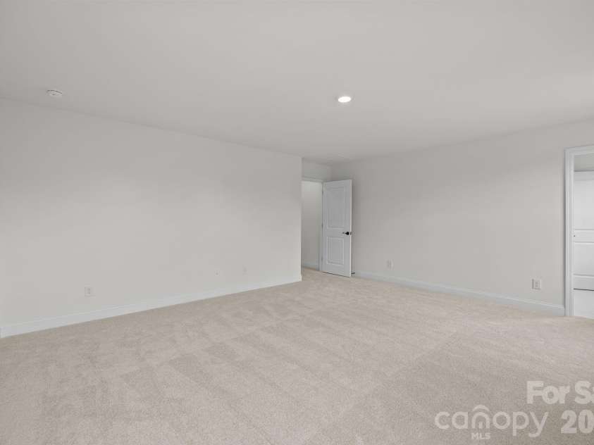 4004 Grommet Court, Matthews, NC 28105.  MLS# CAR4331659, YatesRealty ID 24733. Primary Bedroom