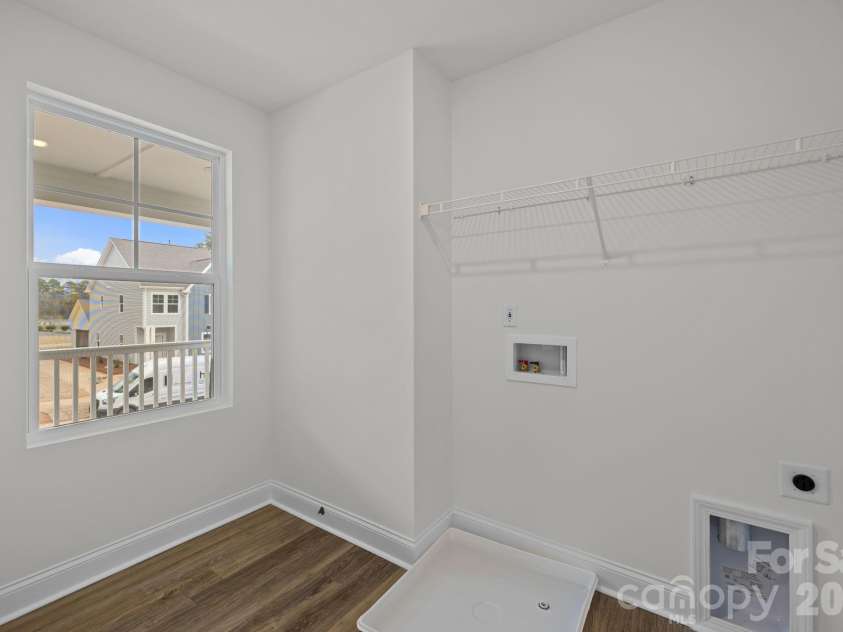 4004 Grommet Court, Matthews, NC 28105.  MLS# CAR4331659, YatesRealty ID 24733. Walk in laundry
