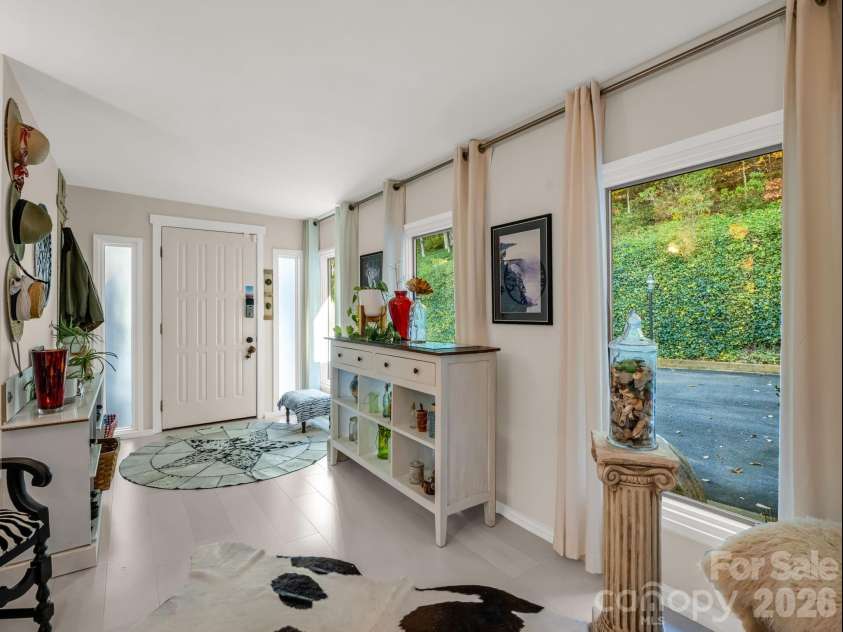200 Piney Mountain Road, Tryon, NC 28782.  MLS# CAR4340345, YatesRealty ID 24734. Bright Foyer