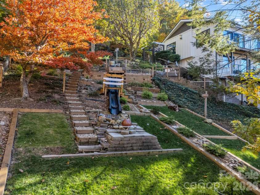 200 Piney Mountain Road, Tryon, NC 28782.  MLS# CAR4340345, YatesRealty ID 24734. Landscape & Pathways