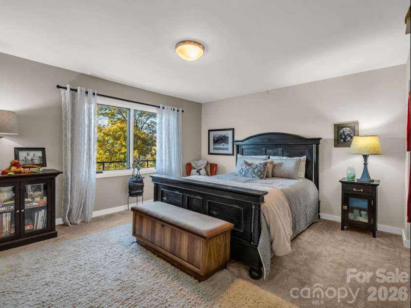 200 Piney Mountain Road, Tryon, NC 28782.  MLS# CAR4340345, YatesRealty ID 24734. Lower Bedroom Suite