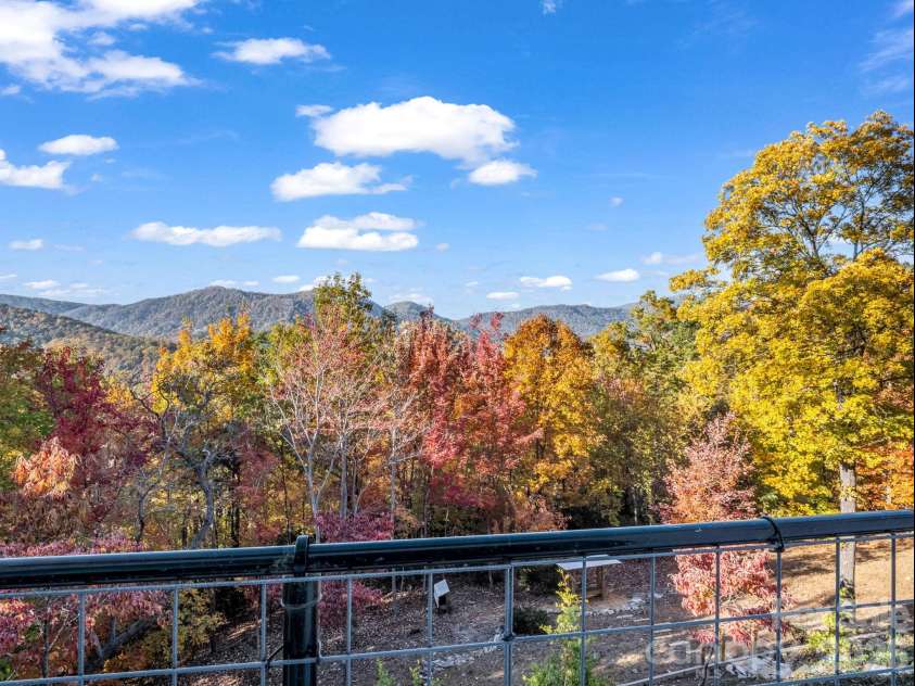 200 Piney Mountain Road, Tryon, NC 28782.  MLS# CAR4340345, YatesRealty ID 24734. Panoramic Views Off Deck