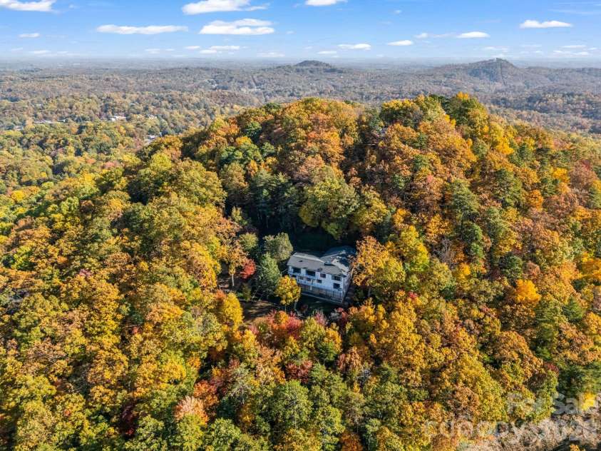 200 Piney Mountain Road, Tryon, NC 28782.  MLS# CAR4340345, YatesRealty ID 24734. Private 3.55 Acres