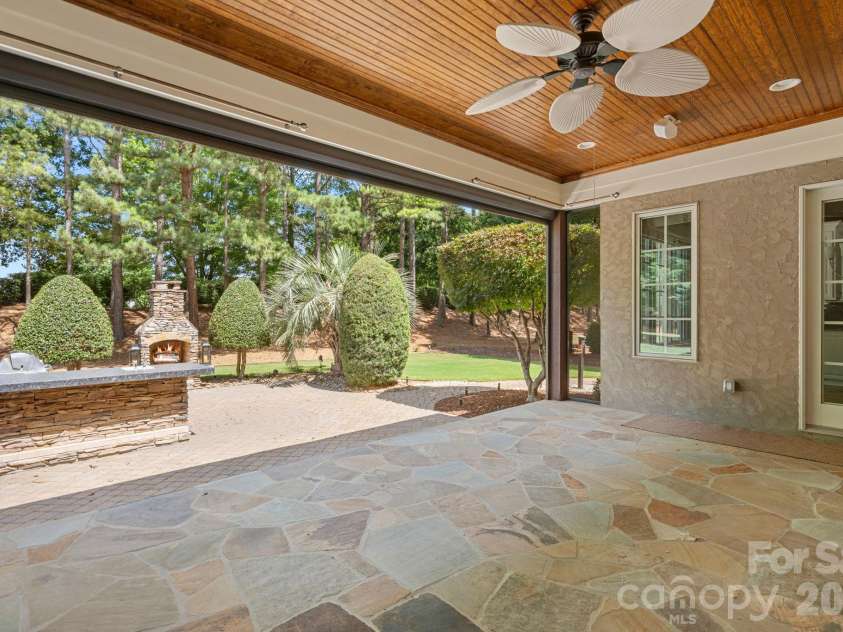 169 Cape Cod Way, Mooresville, NC 28117.  MLS# CAR4358747, YatesRealty ID 24736. Electronic screen on back porch