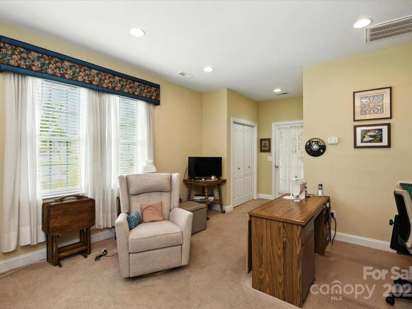 10818 Alvarado Way, Charlotte, NC 28277.  MLS# CAR4275233, YatesRealty ID 24737. In-law suite living room