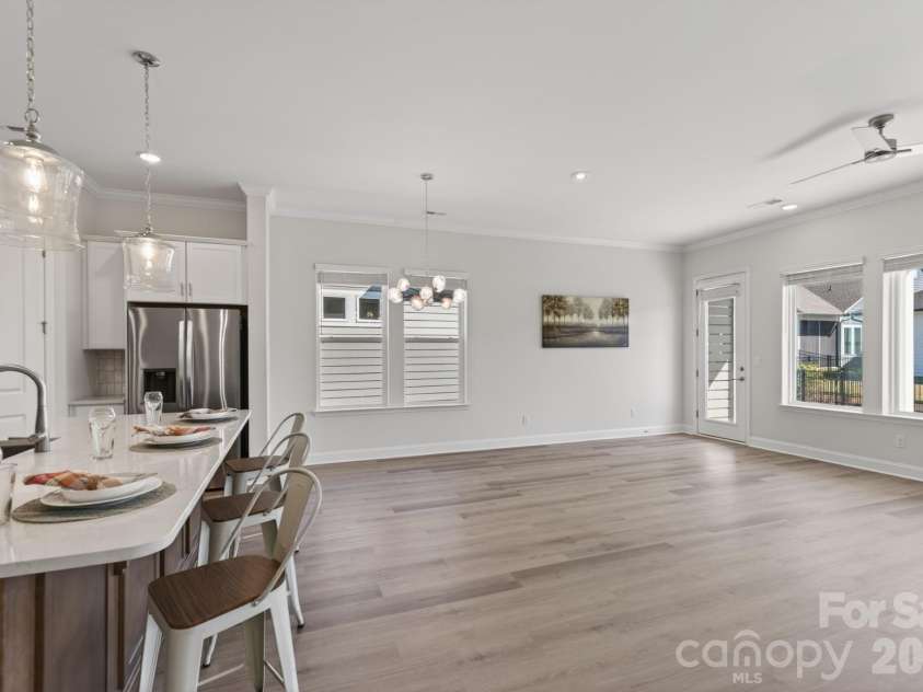 1127 Meander Lane, Waxhaw, NC 28173.  MLS# CAR4361011, YatesRealty ID 24737. Kitchen to Family Room