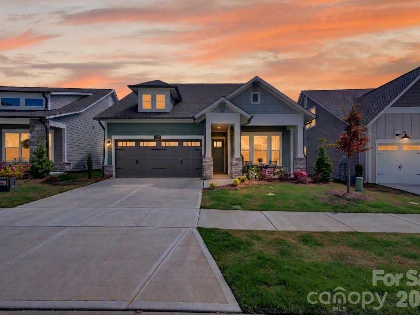 1127 Meander Lane, Waxhaw, NC 28173.  MLS# CAR4361011, YatesRealty ID 24737. Sunset Exterior Shot